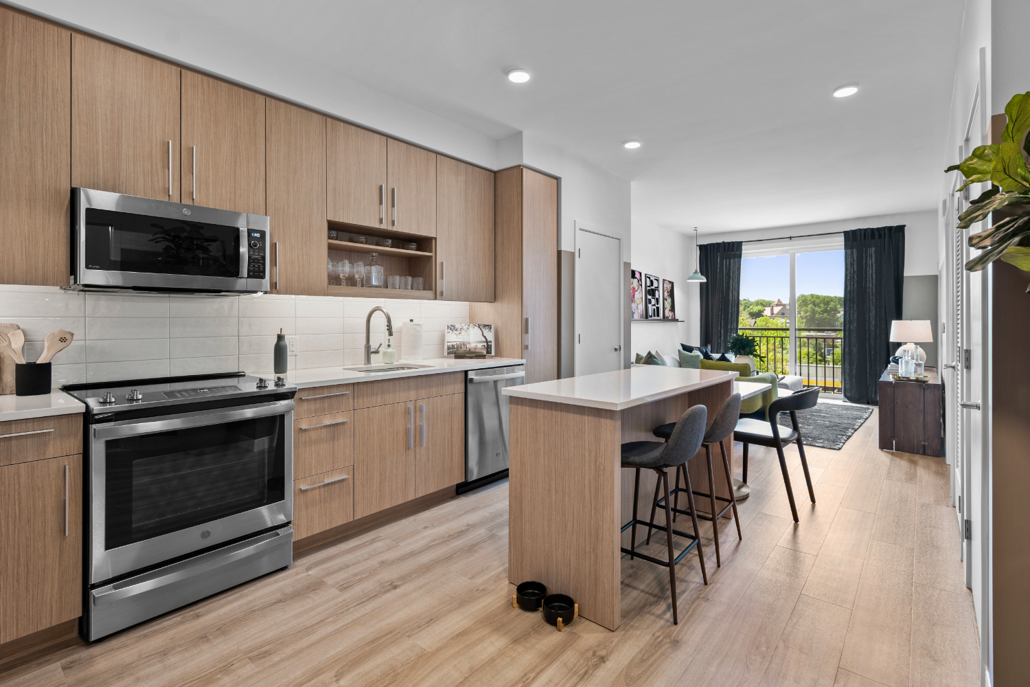 Alder at Allston Yards : Quartz countertops lay the foundation for an extraordinary culinary experience. 	